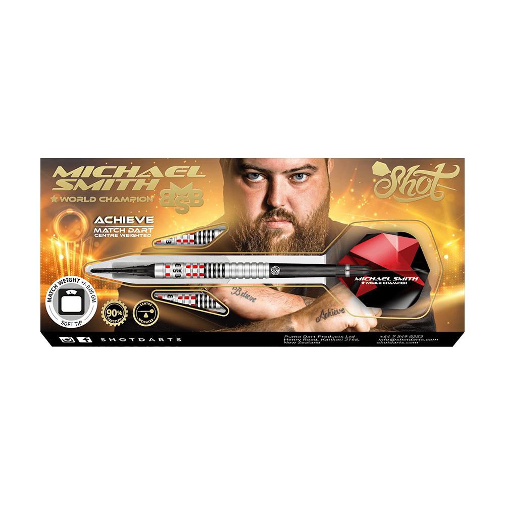 Shot de Michael Smith Achieve Soft Darts Auf dem Bild ist eine Packung mit Softdarts der Marke Shot zu sehen, die vom Weltmeister Michael Smith beworben wird. Die Verpackung zeigt ein Bild von Michael Smith und hebt die Eigenschaften des Produkts hervor.