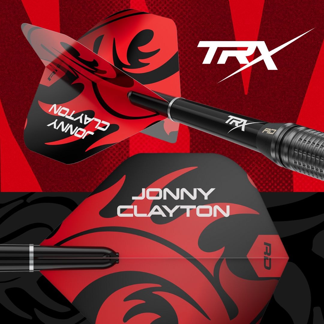 Dardos de acero Red Dragon Jonny Clayton Core Brass - 21 g Das Foto zeigt die Red Dragon Jonny Clayton Core Brass Steeldarts - 21g. Die Darts liegen auf einer ebenen Fläche.