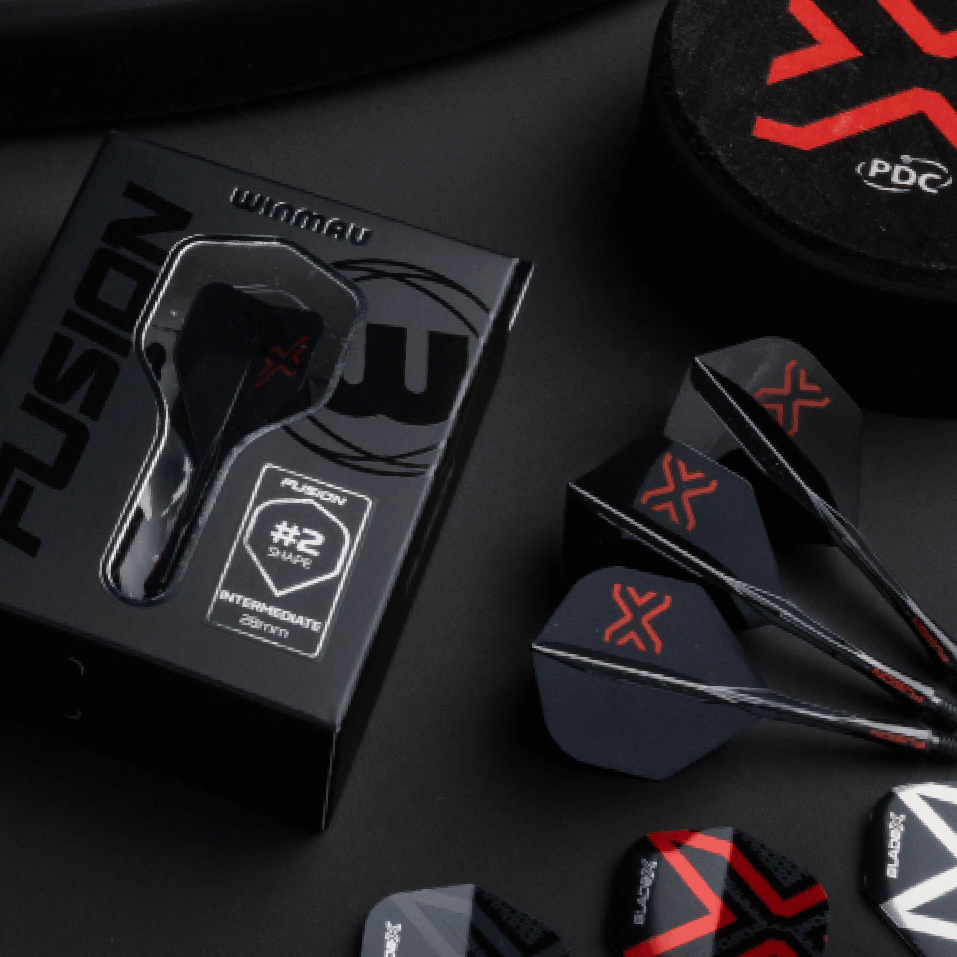 Sistema de eje de vuelo estándar Winmau Fusion Blade X No2 - Negro Hier sieht man das Winmau Fusion Blade X No2 Standard Flight-Shaft-System in Schwarz. Dieses Produkt kombiniert Flight und Schaft für optimale Performance.