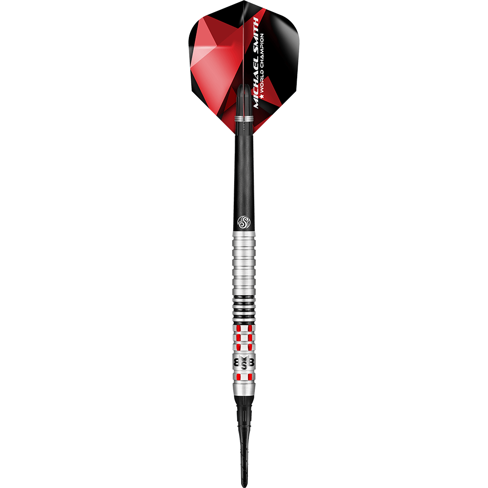 Shot de Michael Smith Achieve Soft Darts Auf dem Bild ist ein Softdartpfeil mit silbernen und schwarzen Elementen zu sehen. Das Flights ist rot-schwarz und trägt die Aufschrift "Michael Smith World Champion".