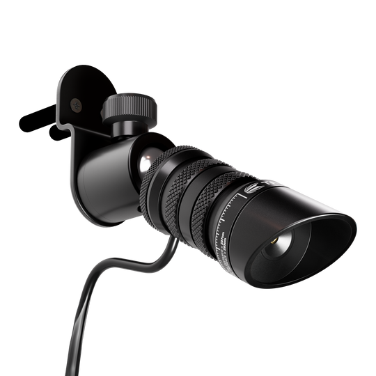 Láser de objetivo MOD Oche Das Bild zeigt das Produkt "Target MOD Laser Oche". Es handelt sich um ein schwarzes Lasergerät mit Wandhalterung und Kabel.