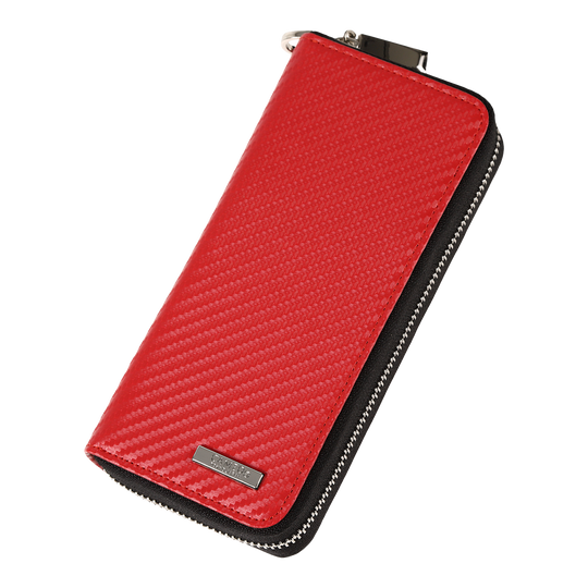 Caso de negocio Cameo Pro3 Das Bild zeigt ein rotes Etui mit einer strukturierten Oberfläche und einem Reißverschluss. An der unteren Ecke befindet sich ein kleines Metallschild mit einer Gravur.