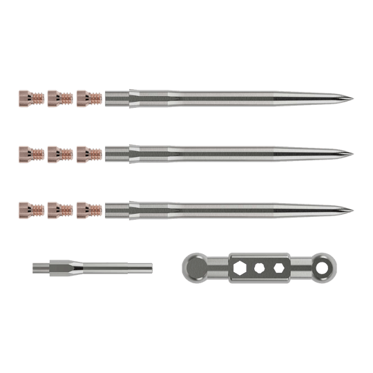 Kit de inicio Caliburn Das Bild zeigt das Caliburn Starter-Kit mit mehreren metallischen Komponenten. Zu sehen sind lange, spitze Stäbe, kleine Schrauben sowie zwei weitere Werkzeugteile.