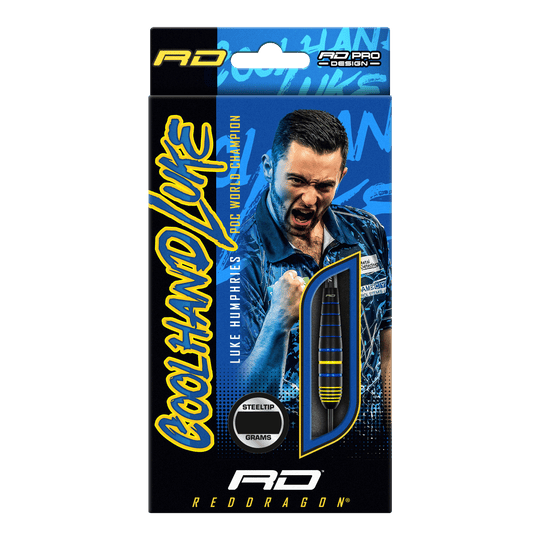 Dardos de acero de latón Red Dragon Luke Humphries, campeón mundial Auf der Verpackung sind die "Red Dragon Luke Humphries World Champion Brass Steeldarts" abgebildet. Im Hintergrund ist ein jubelnder Spieler zu sehen, daneben ist ein Dartpfeil durch ein Sichtfenster sichtbar.