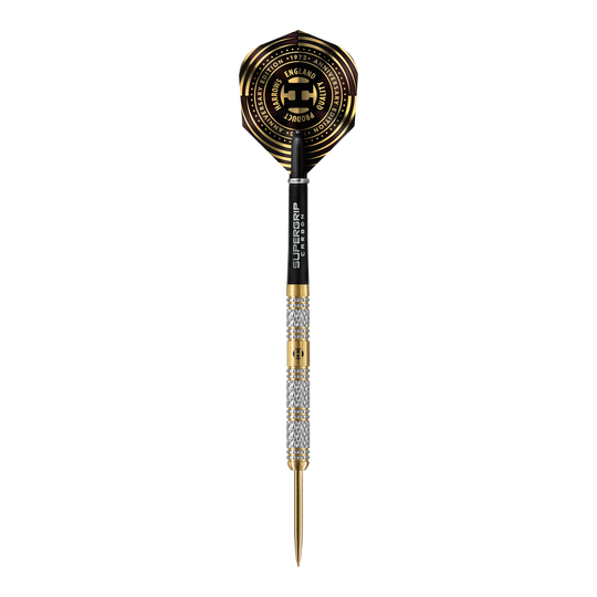 Dardos de acero Magnum edición aniversario de Harrows Das Bild zeigt einen hochwertigen Steeldartpfeil mit goldenen und silbernen Akzenten. Auf dem Flights sind kreisförmige, goldfarbene Muster und der Schriftzug "Anniversary Edition" zu sehen.